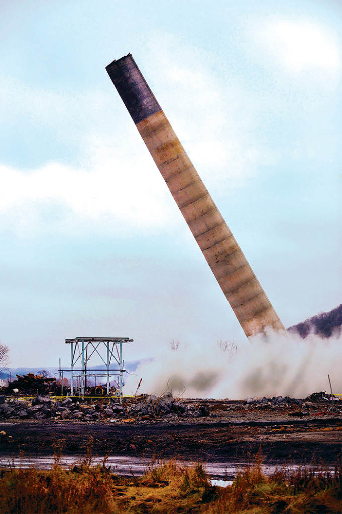 The smoke stack falls on the site of a Detonators shoot in Weirton, WV, December 10, 2008, as seen on episode 10.